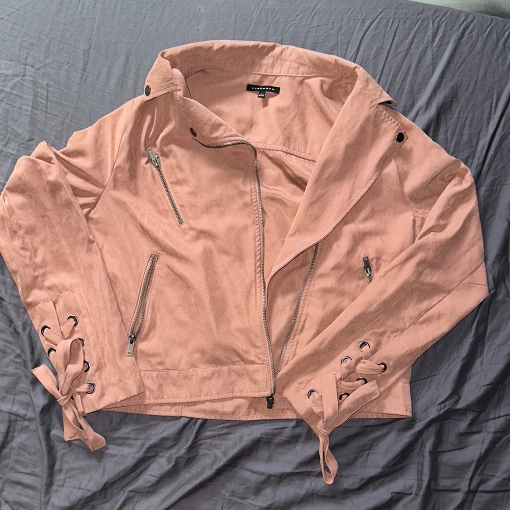 Size L but sits like a medium Staccato jacket.